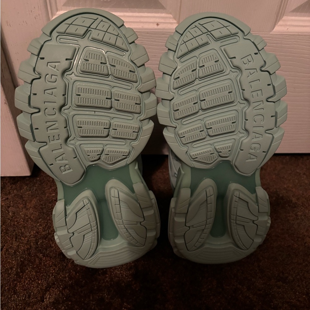 These are a pair of brand new turquoise balenciaga’s. They are truly a beauty!